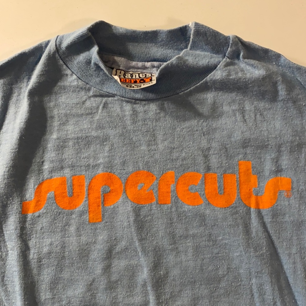 Vintage Supercuts Hanes T-shirt in light blue with orange screen print